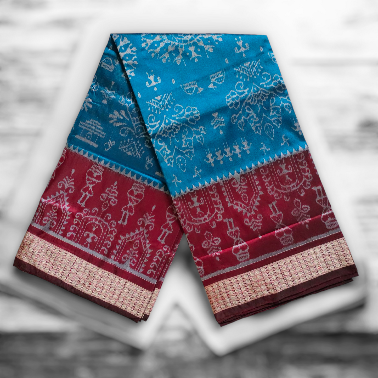 TSC Sambalpuri Bandha Silk Saree – Teal Blue & Maroon with Tribal Alpana Weave & Golden Floral Borders