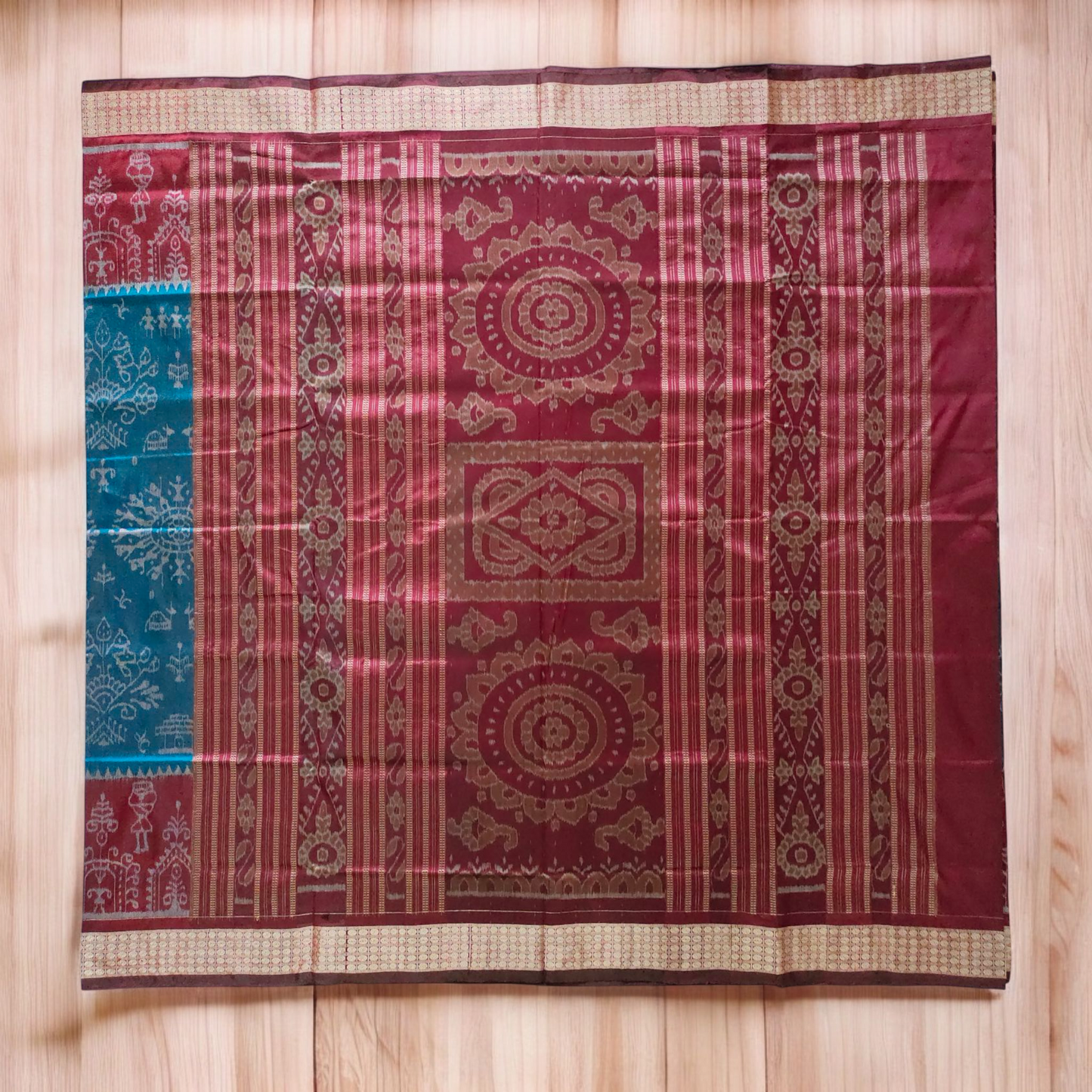 TSC Sambalpuri Bandha Silk Saree – Teal Blue & Maroon with Tribal Alpana Weave & Golden Floral Borders